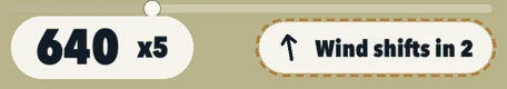 The top of the screen during a round: the score, and a wind chip with a dashed outline that says Wind shifts in 2.